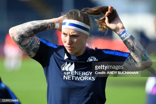 Scotland's number 8 Jade Konkel warms up ahead of the Six Nations international women's rugby union match between Scotland and England at The DAM...