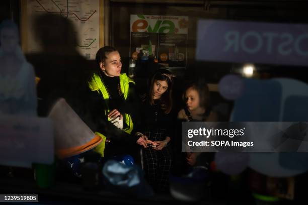 Family sheltering in a subway station. Residents of Kyiv have been sheltering in basements, bunkers and Subway stations which serve as shelter for...