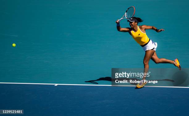 Heather Watson of Great Britain hits a forehand against Belinda Bencic of Switzerland in her third round match on day 6 of the Miami Open at Hard...