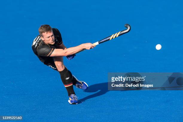 Linus Mueller of Germany controls the ball during the Men FIH Pro League match between Germany and Spain at SparkassenPark on March 26, 2022 in...