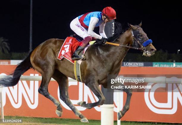 Jockey Lanfranco "Frankie" Dettori takes part in the Dubai World Cup horse racing event at the Meydan racecourse in the Gulf emirate, on March 26,...