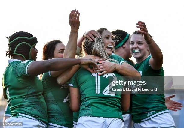 Dublin , Ireland - 26 March 2022; Stacey Flood of Ireland is congratulated by teammates after scoring her side's third try during the TikTok Women's...