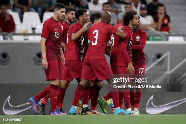 Qatar players celebrate a goal during the international friendly match between Qatar and Bulgaria at Education City Stadium on March 26, 2022 in...