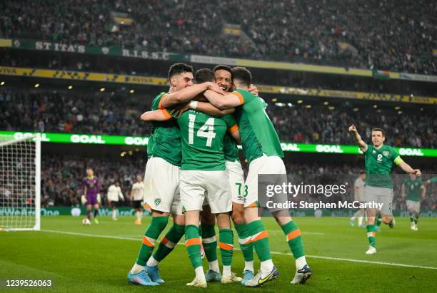 Dublin , Ireland - 26 March 2022; Alan Browne of Republic of Ireland celebrates with teammates after scoring his side's second goal during the...