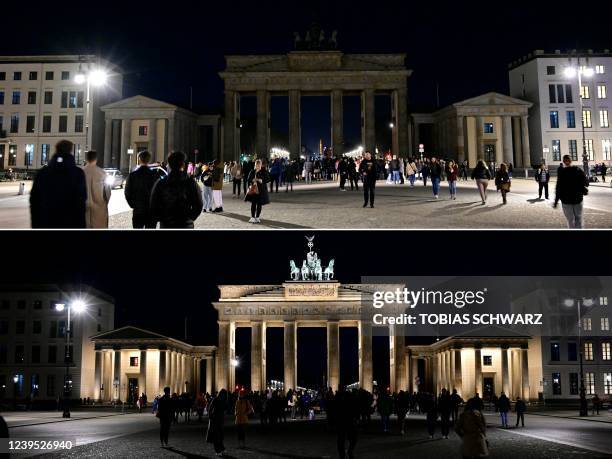 This combination of pictures taken on March 26, 2022 shows the Berlin's Brandenburg Gate illuminated and shortly after its illumination turned off on...