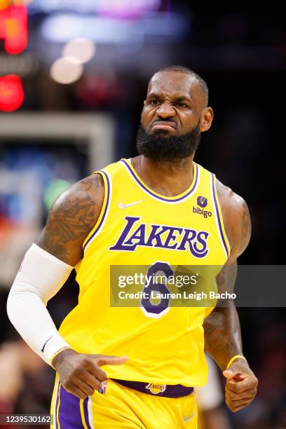 LeBron James of the Los Angeles Lakers looks on during the game against the Cleveland Cavaliers on March 21, 2022 at Rocket Mortgage FieldHouse in...