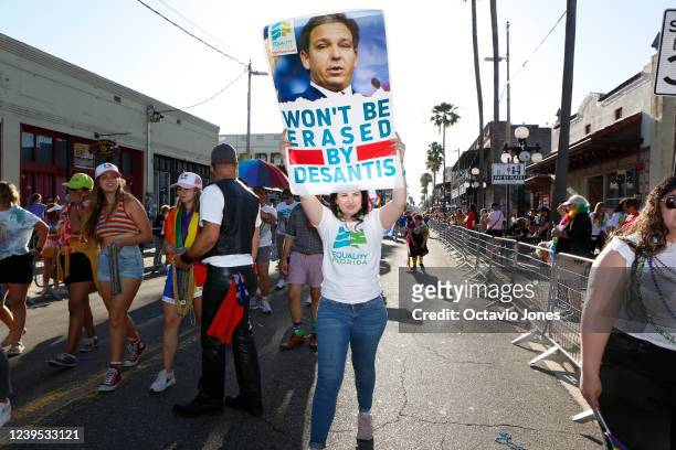 Revelers celebrate on 7th Avenue during the Tampa Pride Parade in the Ybor City neighborhood on March 26, 2022 in Tampa, Florida. The Tampa Pride was...
