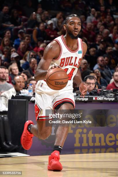 Patrick Williams of the Chicago Bulls dribbles the ball during the game against the Cleveland Cavaliers on March 26, 2022 at Rocket Mortgage...