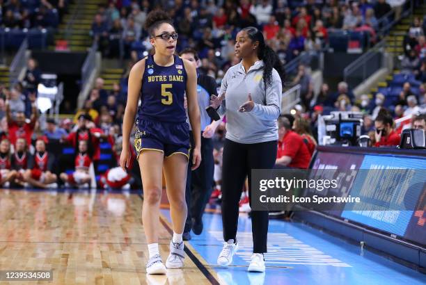 Notre Dame Fighting Irish head coach Niele Ivey speaks with Notre Dame Fighting Irish guard Olivia Miles during the sweet sixteen of the Women's Div...