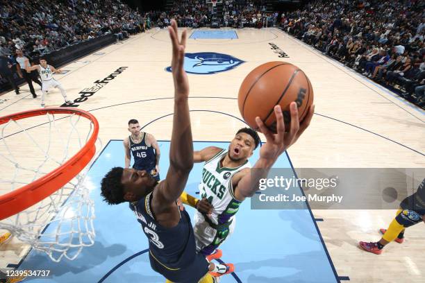 Giannis Antetokounmpo of the Milwaukee Bucks drives to the basket during the game against the Memphis Grizzlies on March 26, 2022 at FedExForum in...