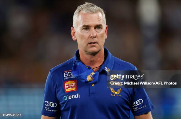 Adam Simpson, Senior Coach of the Eagles looks on during the 2022 AFL Round 02 match between the North Melbourne Kangaroos and the West Coast Eagles...