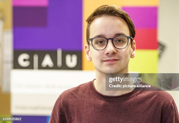 March 2022, Schleswig-Holstein, Kiel: Paul Oppermann, a student of Kiel University, who studied Russian in Irkutsk at Baikal, sits in the information...