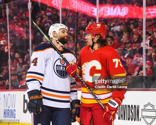 Tyler Toffoli of the Calgary Flames exchanges words with Zack Kassian of the Edmonton Oilers during the second period an NHL game at Scotiabank...