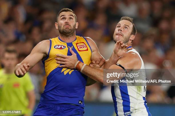 Jack Darling of the Eagles and Josh Walker of the Kangaroos compete for the ball during the 2022 AFL Round 02 match between the North Melbourne...