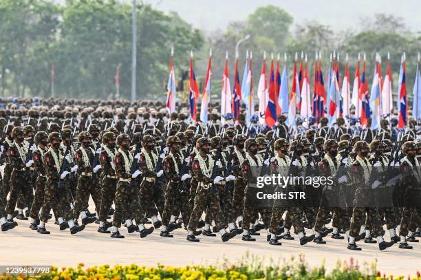 Members of the Myanmar military take part in a parade to mark the country's 77th Armed Forces Day in Naypyidaw on March 27, 2022.