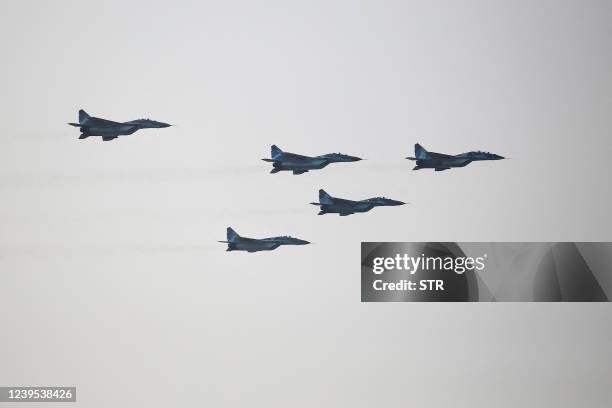 Myanmar Air Force fighter jets take part in a display to celebrate Myanmar's 77th Armed Forces Day in Naypyidaw on March 27, 2022.