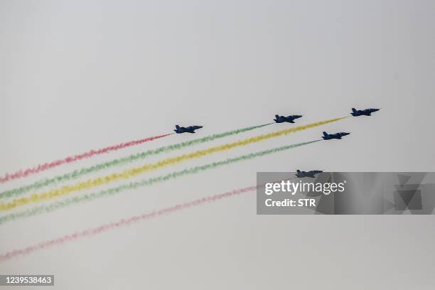 Myanmar Air Force fighter jets take part in a display to celebrate Myanmar's 77th Armed Forces Day in Naypyidaw on March 27, 2022.