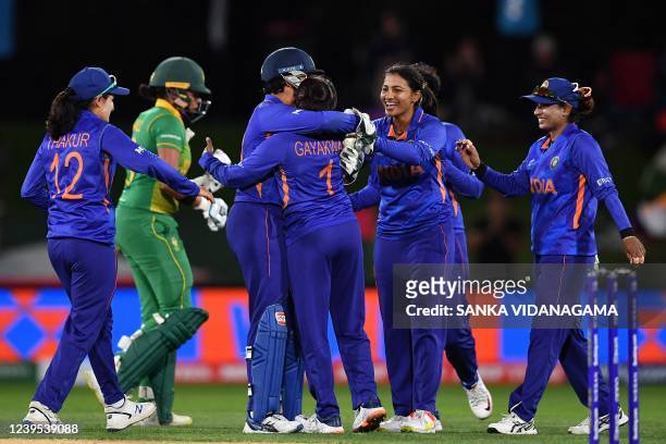 Indian team celebrate the wicket of South Africa's Lara Goodall during the Women's Cricket World Cup match between South Africa and India at Hagley...