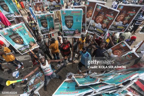 Crowd of the Nigerias ruling political party supporters, the All Progressive Congress, gather outside the partys National Convention, in Abuja,...