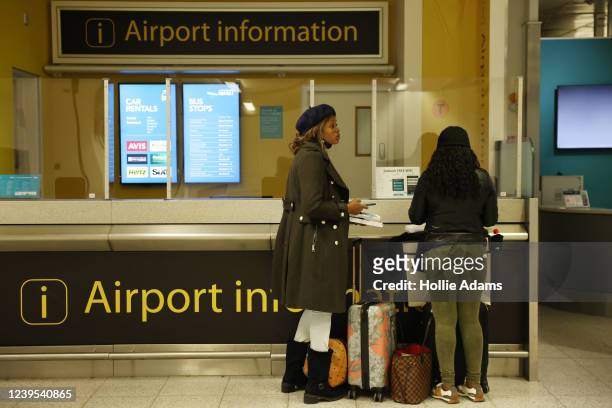 Travellers wait for help at Gatwick Airport on March 27, 2022 in London, England. Gatwick's South terminal closed in June 2020 to reduce costs during...