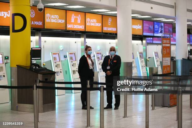 Easy Jet workers at Gatwick Airport on March 27, 2022 in London, England. Gatwick's South terminal closed in June 2020 to reduce costs during the...