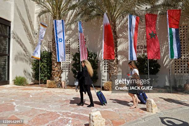 Attendees arrive at the Kedma hotel ahead of Israel's Negev Summit, that will be attended by US Secretary of State Antony Blinken, Israels Foreign...