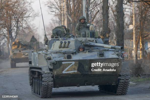 Russian soldiers are seen on a tank in Volnovakha district in the pro-Russian separatists-controlled Donetsk, in Ukraine on March 26, 2022....