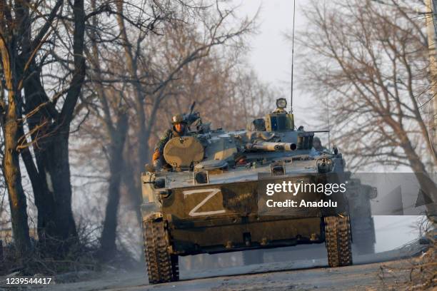 Russian soldiers are seen on a tank in Volnovakha district in the pro-Russian separatists-controlled Donetsk, in Ukraine on March 26, 2022....