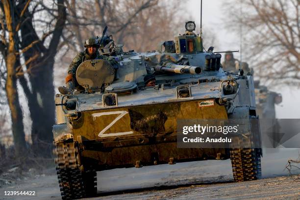 Russian soldiers are seen on a tank in Volnovakha district in the pro-Russian separatists-controlled Donetsk, in Ukraine on March 26, 2022....