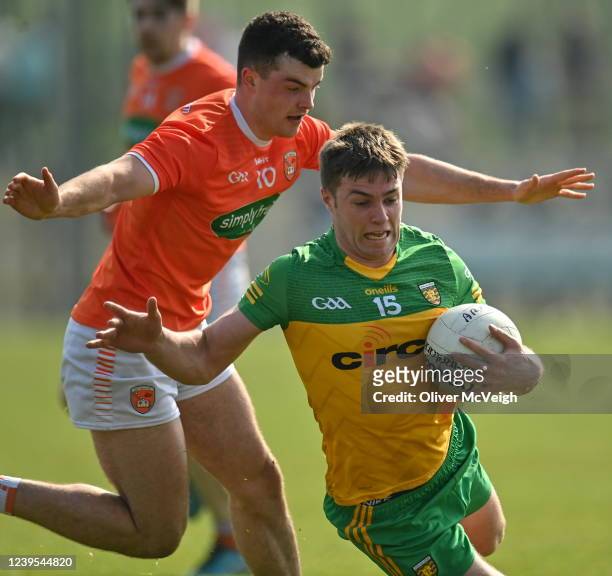 Donegal , Ireland - 27 March 2022; Conor O'Donnell of Donegal in action against Conor O'Neill of Armagh during the Allianz Football League Division 1...