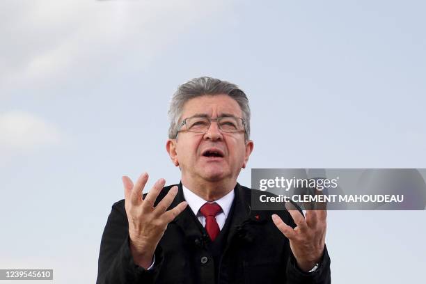 "La France Insoumise" party presidential candidate Jean-Luc Melenchon gestures as he delivers a speech during his meeting in Marseille, southern...