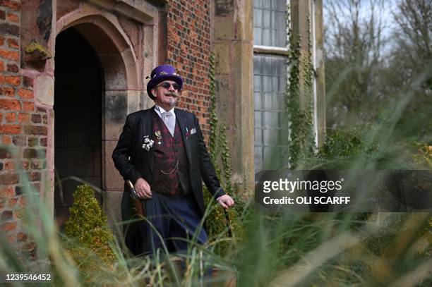 Steampunk enthusiast poses outside during the Steampunk Weekend at Heskin Hall, in Chorley, north-west England on March 27 the second day of the...