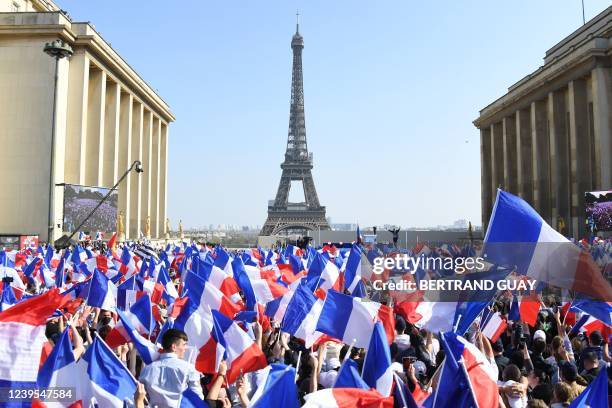 French far-right Reconquete! party President and presidential candidate Eric Zemmour waves to supporters a he arrives on stage during a campaign...