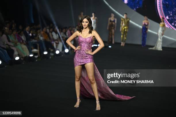 Bollywood actor Ananya Panday presents a creation by designer Falguni Shane Peacock during the grand finale of the FDCI x Lakme Fashion Week, in New...