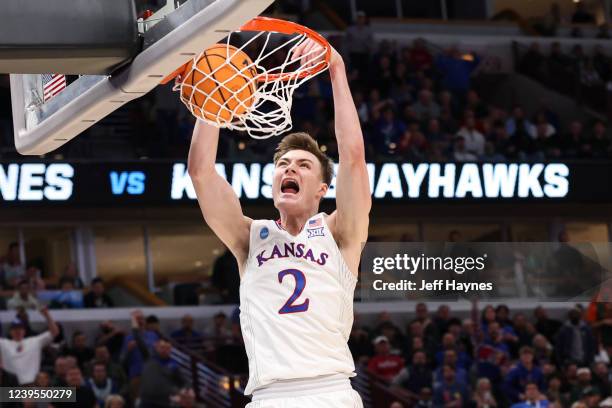 Christian Braun of the Kansas Jayhawks dunks the ball against the Miami Hurricanes during the Elite Eight round of the 2022 NCAA Men's Basketball...