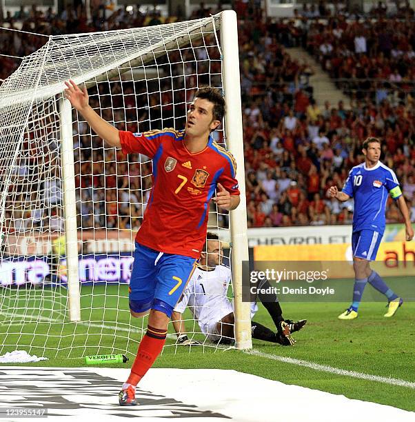 David Villa of Spain celebrates after scoring Spain's sixth goal during the EURO 2012 Qualifier match between Spain and Liechtenstein at estadio Las...