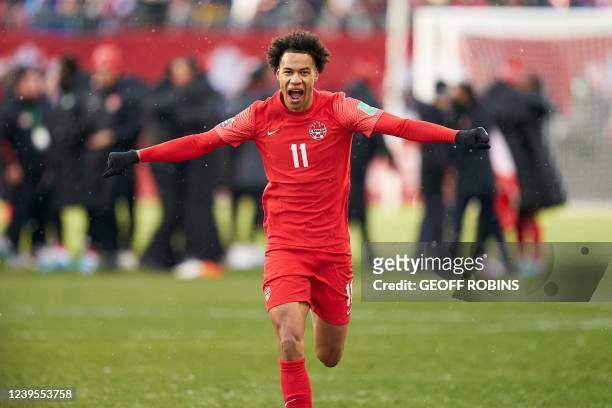 Canadas Tajon Buchanan celebrates after Canada defeated Jamaica 4-0 in their World Cup Qualifying match at BMO Field in Toronto, Ontario, March 27,...