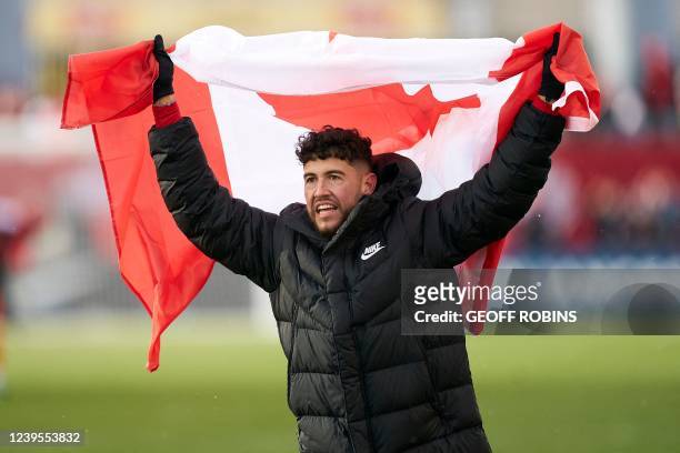 Canadas Jonathan Osorio celebrates after Canada defeated Jamaica 4-0 in their World Cup Qualifying match at BMO Field in Toronto, Ontario, March 27,...