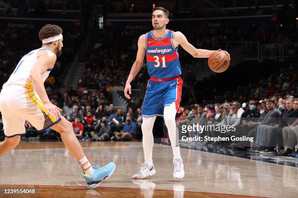 Tomas Satoransky of the Washington Wizards dribbles the ball during the game against the Golden State Warriors on March 27, 2022 at Capital One Arena...