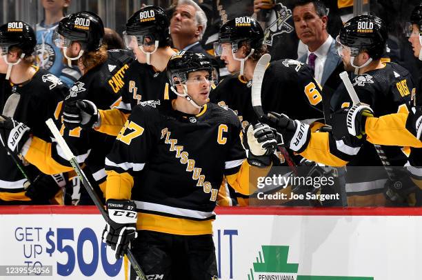 Sidney Crosby of the Pittsburgh Penguins celebrates his second period goal against the Detroit Red Wings at PPG PAINTS Arena on March 27, 2022 in...