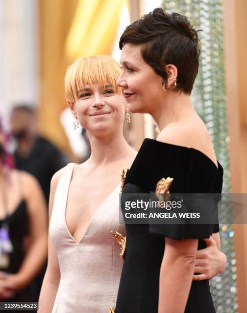 Director and actress Maggie Gyllenhaal and Irish actress Jessie Buckley attend the 94th Oscars at the Dolby Theatre in Hollywood, California on March...