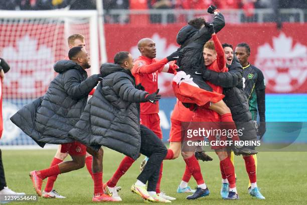 The Canadian mens soccer team celebrate after defeating Jamaica 4-0 in their World Cup Qualifying match at BMO Field in Toronto, Ontario, Canada...