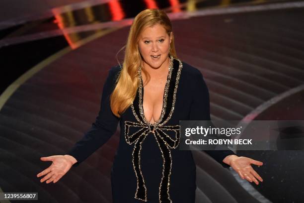 Actress and comedian Amy Schumer speaks onstage during the 94th Oscars at the Dolby Theatre in Hollywood, California on March 27, 2022.