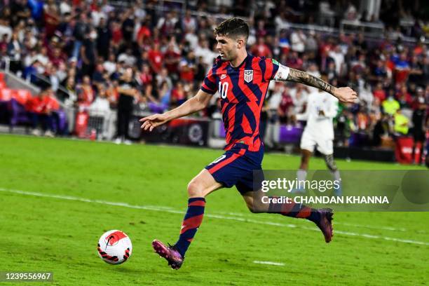 S Christian Pulisic takes a shot during US Mens National Teams 2022 FIFA World Cup Qualifier vs. Panama at Exploria Stadium in Orlando, Florida on...