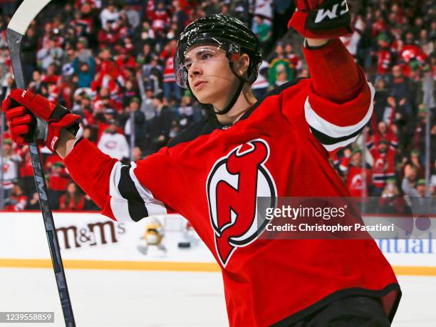 Yegor Sharangovich of the New Jersey Devils reacts after scoring the game winning goal during the shootout to defeat the Montreal Canadiens 3-2 at...