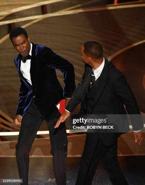 Actor Will Smith slaps US actor Chris Rock onstage during the 94th Oscars at the Dolby Theatre in Hollywood, California on March 27, 2022.