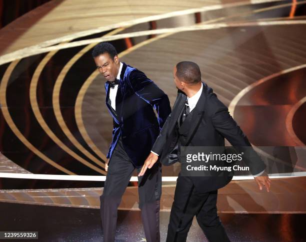 March 27, 2022. Chris Rock and Will Smith onstage during the show at the 94th Academy Awards at the Dolby Theatre at Ovation Hollywood on Sunday,...
