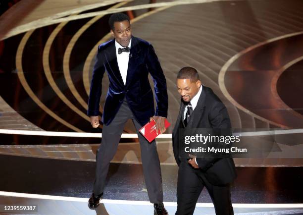 March 27, 2022. Chris Rock and Will Smith onstage during the show at the 94th Academy Awards at the Dolby Theatre at Ovation Hollywood on Sunday,...