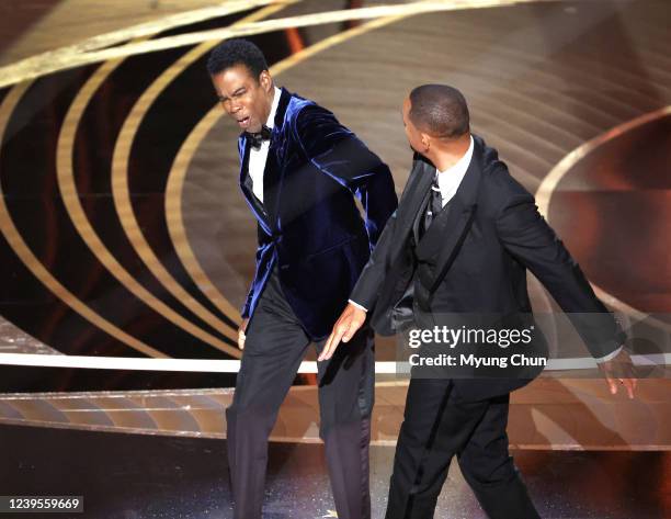 March 27, 2022. Chris Rock and Will Smith onstage during the show at the 94th Academy Awards at the Dolby Theatre at Ovation Hollywood on Sunday,...