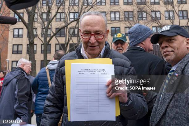 Senate Majority Leader, Chuck Schumer signs a petition to keep New York's VA Medical Centers open at a press conference outside the Manhattan's VA...